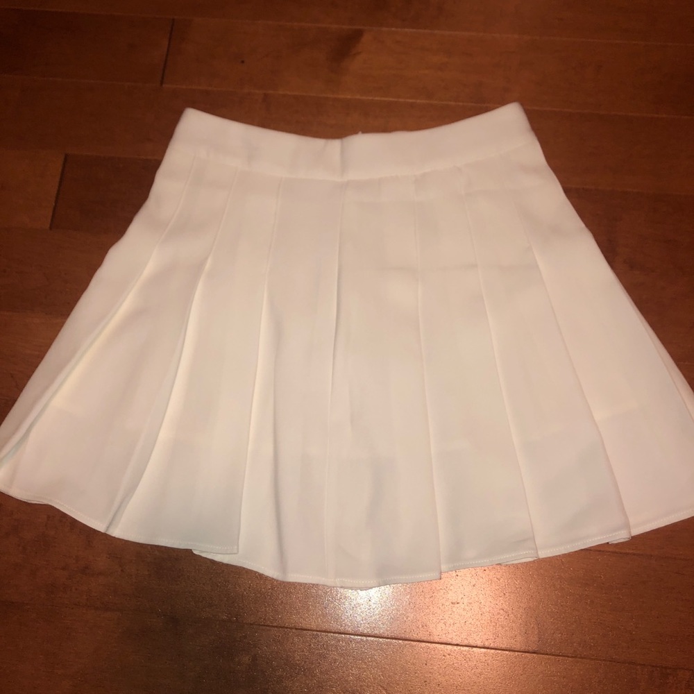White pleated tennis skirt